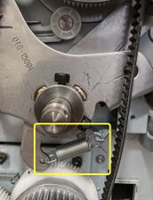 The reattached "follower spring"—out of frame this is pulling the cam follower into contact with the rim of the metal cam of the main pulley.